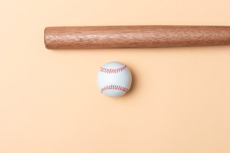 Baseball bat and ball on beige background. Horizontal sport theme poster, greeting cards, headers, website and appの写真素材