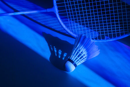Badminton racket and shuttlecock in vibrant bold gradient holographic neon colors. Horizontal sport theme poster, greeting cards, headers, website and appの写真素材