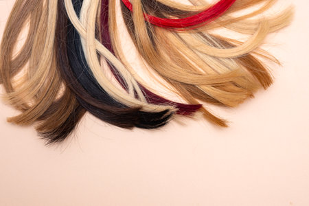 Hair extension equipment of natural hair. Hair samples of different colors. Fashion conceptの写真素材