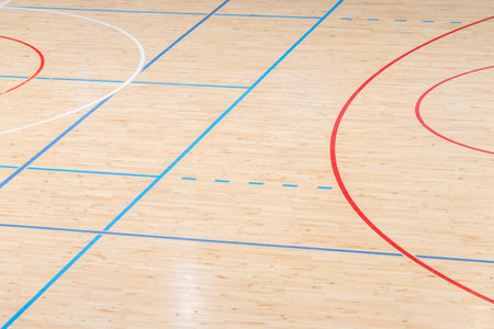 Wooden floor basketball, badminton, futsal, handball, volleyball, football, soccer court. Wooden floor of sports hall with marking lines on wooden floor indoor, gym courtの写真素材