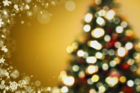 christmas tree background, image blur colorful bokeh defocused lights decoration and gold backgroundの写真素材