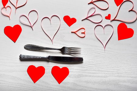 Wooden white background with red hearts. The concept of Valentine Day.の写真素材