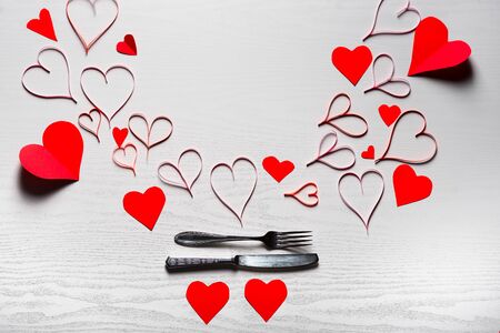 Wooden white background with red hearts. The concept of Valentine Day.の写真素材