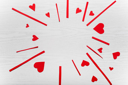 Wooden white background with red hearts. The concept of Valentine Day.の写真素材