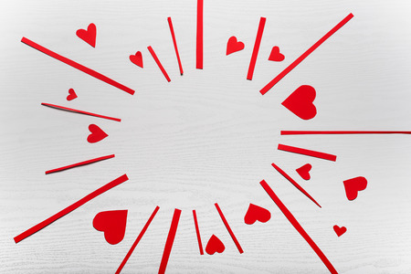 Wooden white background with red hearts. The concept of Valentine Day.の写真素材