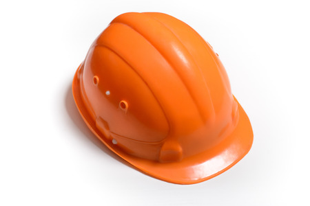helmet for head protection in construction on a white backgroundの写真素材
