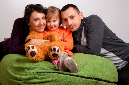 smiling family portrait close up, on a white background, Studioの写真素材