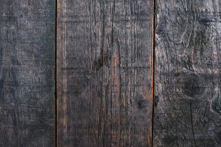 wood brown grain texture, dark wall background, top view of wooden tableの写真素材