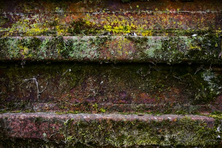 dark metal door rusty corroded texture backgroundの写真素材
