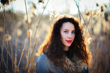 portrait of a beautiful girl in the street, gorgeous spring dayの写真素材