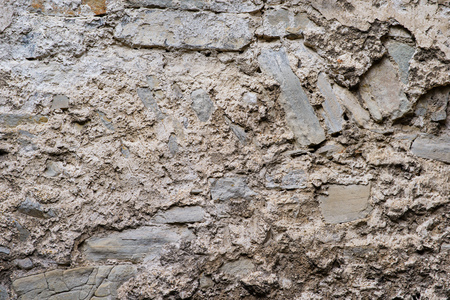 texture of old medieval castle wall made from gray stones.の写真素材