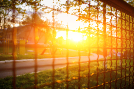 fence with metal grid in perspective, backgroundの写真素材