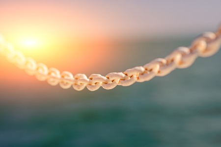white chain on a liner in the sea.の写真素材