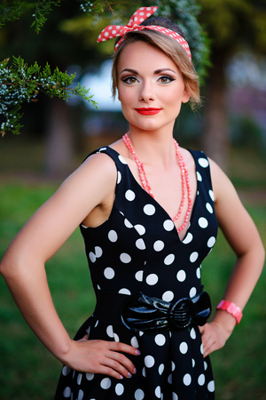 young beautiful caucasian woman posing in a dress .の写真素材