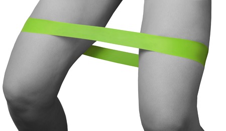 Close-up isolated green sport strap for stretching.の写真素材