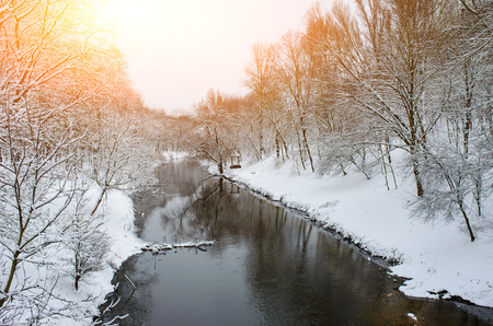 Winter landscape with the river in frosty day.の写真素材