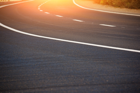 Asphalt road with marking lines white stripes.の写真素材