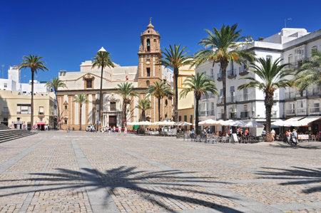 Santiago Church and pavement cafe in Cathedral Square, Cadiz, Cadiz Province, Andalucia, Spain, Western Europe.の写真素材