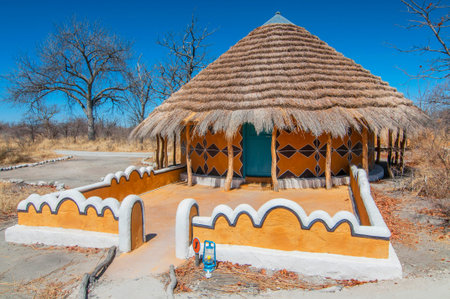 Traditional hut accommodation at Planet Baobabin Botswana, Africa.の写真素材