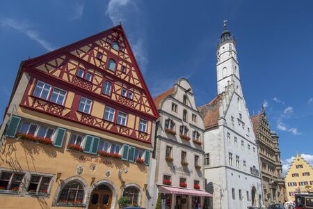 Shops, restaurants and half timbered houses on Herrngasse street in Rothenburg ob der Tauber, Bavaria Germany.の写真素材