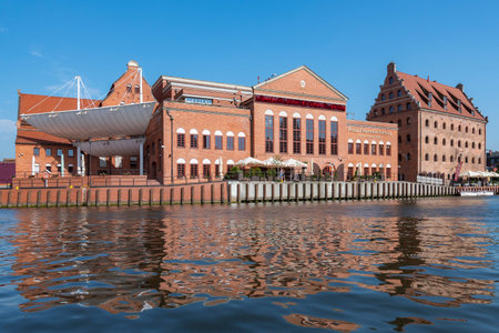 Philharmonic Hall on the Olowianka Island in Gdansk and Motlawa River, Poland.