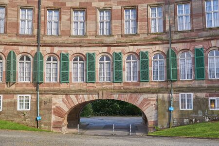 detail of castle wilhelmshÃÂ¶he, green window shutter on ancient facadeのeditorial素材