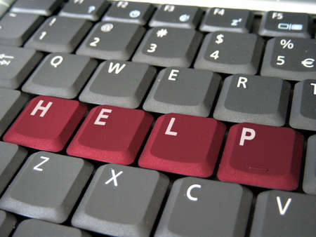 Red help on a notebook keyboardの写真素材