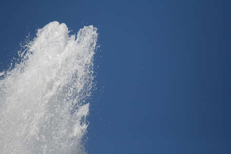 Water jumping from an artesian fountainの写真素材