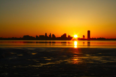 Dawn breaking over the river skylineの写真素材