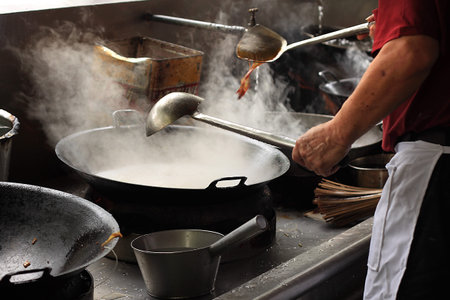 Chef at wokの写真素材