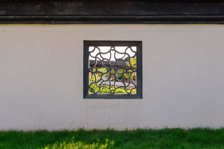 Window frame at the brick wallの写真素材