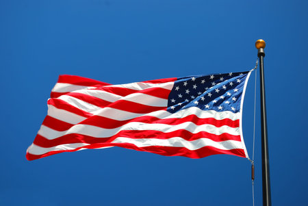 United State flag in the sun