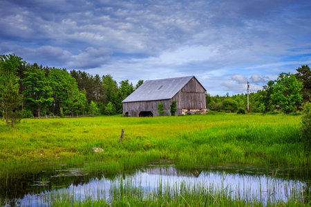 Barn on Rural Landscape in Summerの写真素材