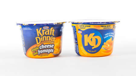 TORONTO, CANADA - FEBRUARY 9, 2016 : Kraft Dinner Macaroni and Cheese Personal Portions in an illustrative editorial on bright backgroundのeditorial素材