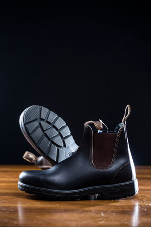 TORONTO, CANADA - NOVEMBER 24, 2015 : Blundstone Leather Boots on a dark studio backgroundのeditorial素材