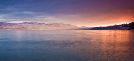 scenic sunset on mountain lakeの写真素材