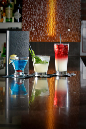 alcoholic cocktails at a restaurantの写真素材