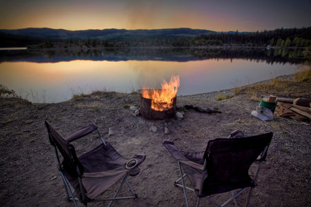campsite fire pit and chairsの写真素材