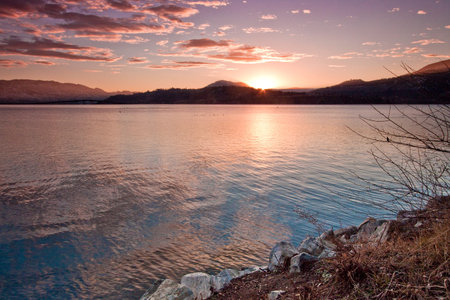 scenic sunset on mountain lake