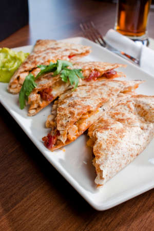 plate of quesadilla at a restaurantの写真素材