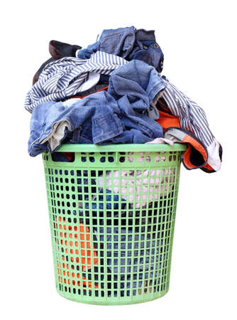 pile of dirty laundry in a washing basket, laundry basket with colorful towel, basket with clean clothes, colorful clothes in a laundry basket on white backgroundの写真素材