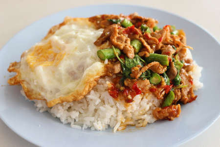 Kao-Pad-Kra-Prao, spicy food, chili food, or Thai rice with pork and basil, Thailand street foodの写真素材