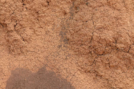 soil brown red background texture (selective focus)の写真素材