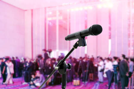 Microphone close up on Blurred many people, newspaperman, mass media seminar at Meeting room business big event hall Conference backgroundの写真素材