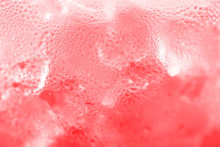 water drop soda ice baking background fresh cool ice red texture, selective focusの写真素材
