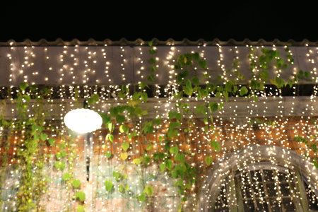 abstract bokeh light lamp on Spacing wall night time for blurred background decoration restaurant or...