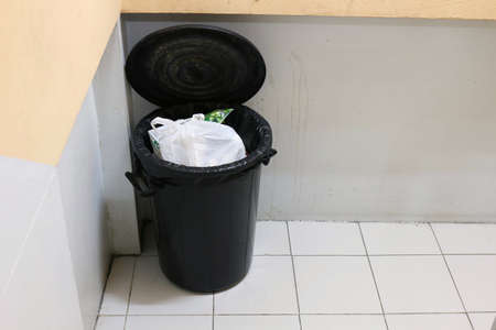 Bin Garbage or Trash on sidewalks staircase side  in apartmentの写真素材