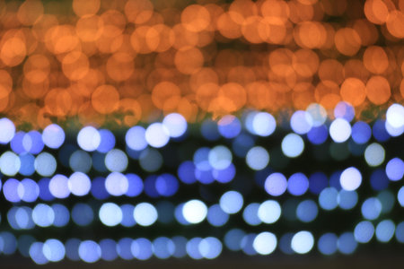 Colorful bokeh light night background two tone wall, gold and nature background blurred bokeh bright, texture lightingの写真素材