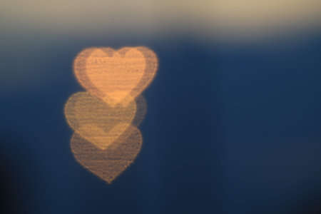 Valentines Colorful heart-shaped on black background lighting bokeh for decoration at night backdrop...