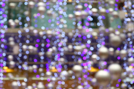 purple abstract bokeh cycle lighting vivid colorful background, violet glitter bokeh blurred backgroundの写真素材